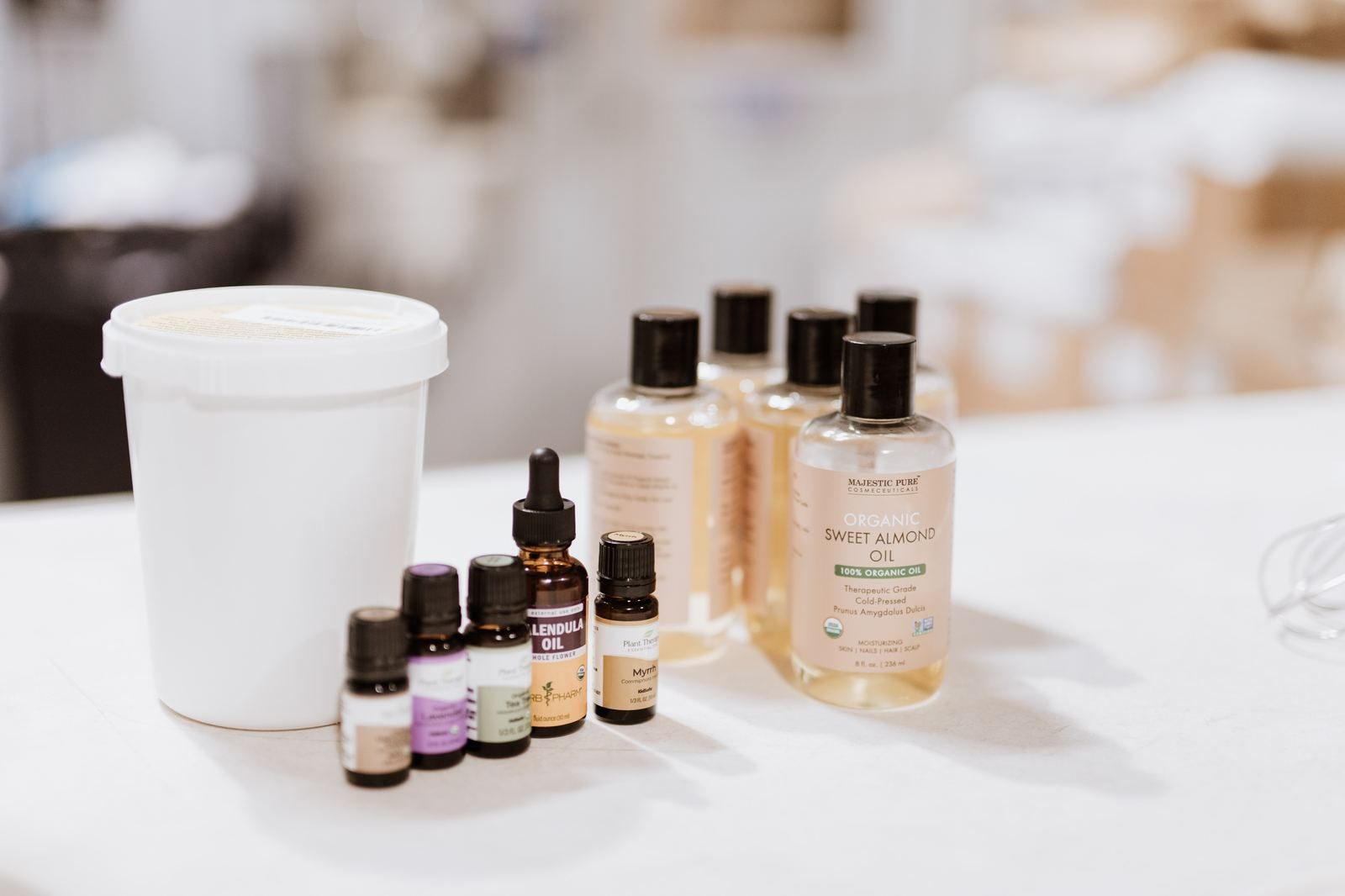 Raw ingredients and oils on the formulation bench