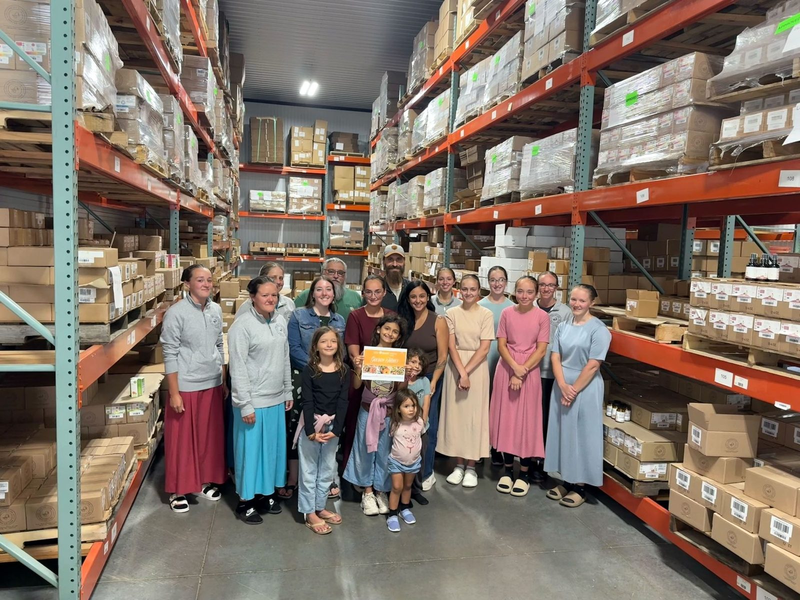 The Edens Answers and Sprigs Life team in the warehouse